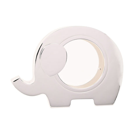 Silverplated metal elephant money box with raised trunk, rounded ear, and round front window to view coins, on a plain white background.