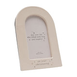 Cream ceramic arch-shaped photo frame for a 6 x 4in print, with "on your christening" in silver foil and star details along the base, shown on a plain white background.