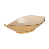Bongosi Decorative Bowl, a long leaf-shaped aluminium dish with a gold exterior and footed base, glossy cream interior, and pointed curved rim, shown on a plain white background.