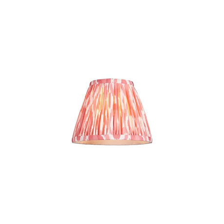 Endon Brenwell 16cm tapered lamp shade in coral pink and white ikat printed faux silk with gathered pleats and taped edges, on a white background.