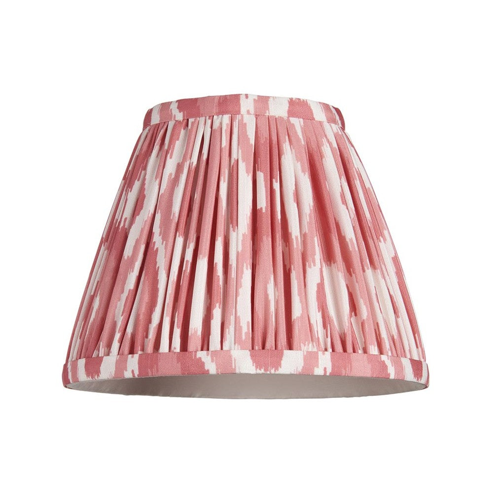 Endon Brenwell 16cm tapered lamp shade in coral pink and white ikat printed faux silk with gathered pleats and taped edges, on a white background.