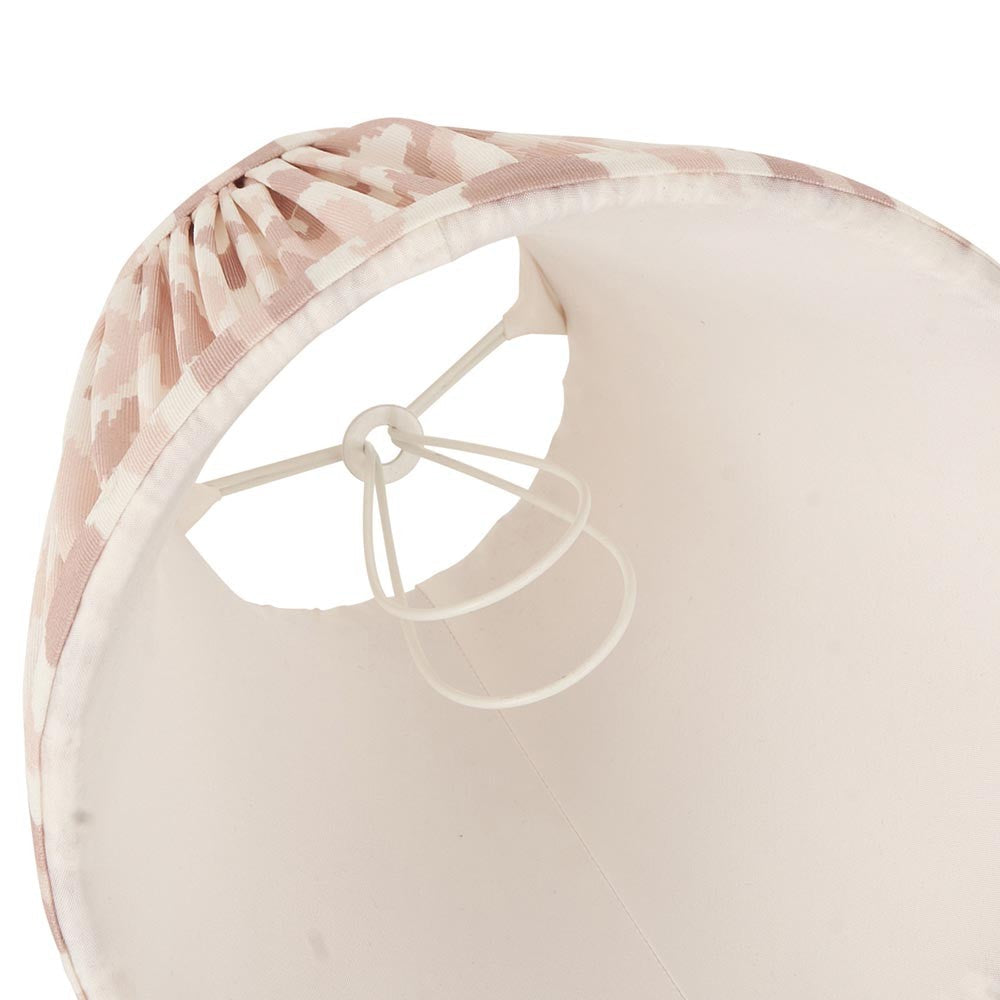 Underside view of Endon Brenwell 16cm tapered lamp shade in neutral, showing pleated ikat faux silk, plain inner lining and candle clip fitting.