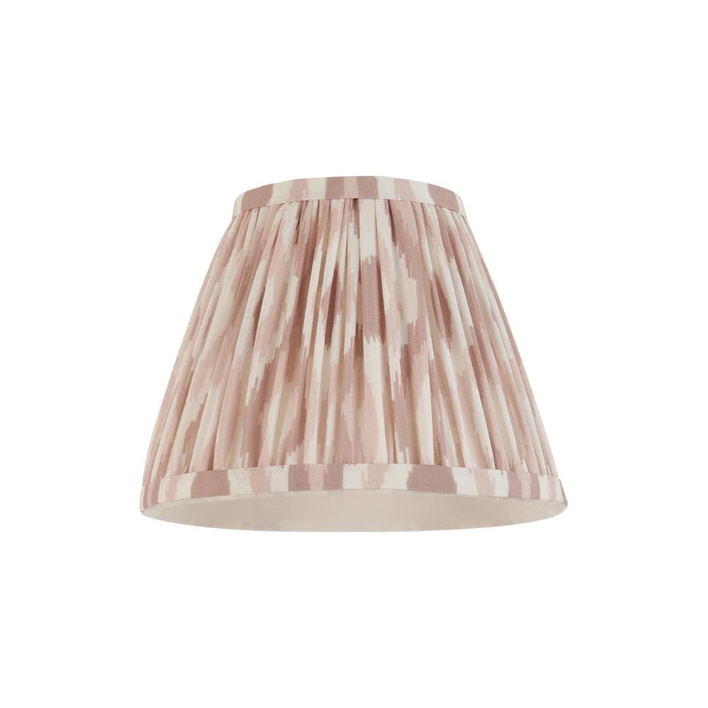 Endon Brenwell 16cm tapered lamp shade in pleated faux silk with a neutral pink and cream ikat print and taped edges, on a plain white background.