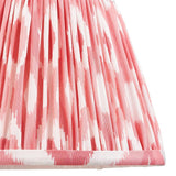 Endon Brenwell 20cm tapered lamp shade in coral pink and white, shown close-up with gathered pleated faux silk, ikat print and taped edge trim.