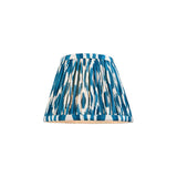 Endon Brenwell 20cm tapered lamp shade in marlin blue and white ikat printed pleated faux silk, shown on a plain white background.