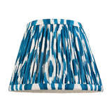 Endon Brenwell 20cm tapered lamp shade in marlin blue and white ikat print pleated faux silk with taped edging, shown on a plain background.
