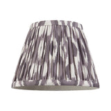 Endon Brenwell 20cm tapered lamp shade in pearl grey faux silk with pleated ikat print and taped edging, shown on a plain white background.