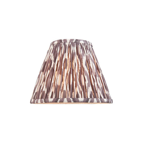 Endon Brenwell 25cm tapered lamp shade in pearl grey pleated faux silk with an ikat pattern in grey, cream and brown tones, on a white background.