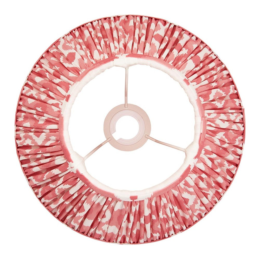 Endon Brenwell 30cm tapered lamp shade in coral pink and white ikat print faux silk, pleated with taped edges and gimbal fitting, top view on white.