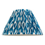 Endon Brenwell 30cm tapered lamp shade in marlin blue and white ikat printed pleated faux silk, shown on a plain white background.
