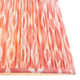 Endon Brenwell 35cm tapered lamp shade in pleated faux silk with a coral pink and white ikat print and taped edge trim.
