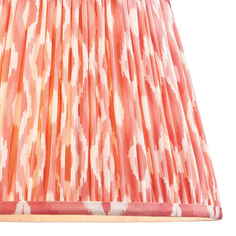Endon Brenwell 35cm tapered lamp shade in pleated faux silk with a coral pink and white ikat print and taped edge trim.