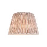 Endon Brenwell 35cm tapered lamp shade in pleated faux silk with a neutral ikat print in soft pink and beige tones, shown on a plain white background.