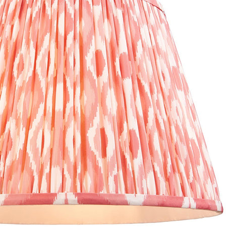 Endon Brenwell 40cm tapered lamp shade in coral pink and white, close-up of the gathered pleated faux silk with ikat pattern and taped edge trim.