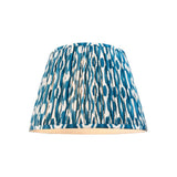 Endon Brenwell 40cm tapered lamp shade in marlin blue and white ikat printed pleated faux silk with taped edging, on a plain white background.