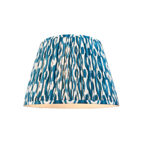 Endon Brenwell 40cm tapered lamp shade in marlin blue and white ikat printed pleated faux silk with taped edging, on a plain white background.