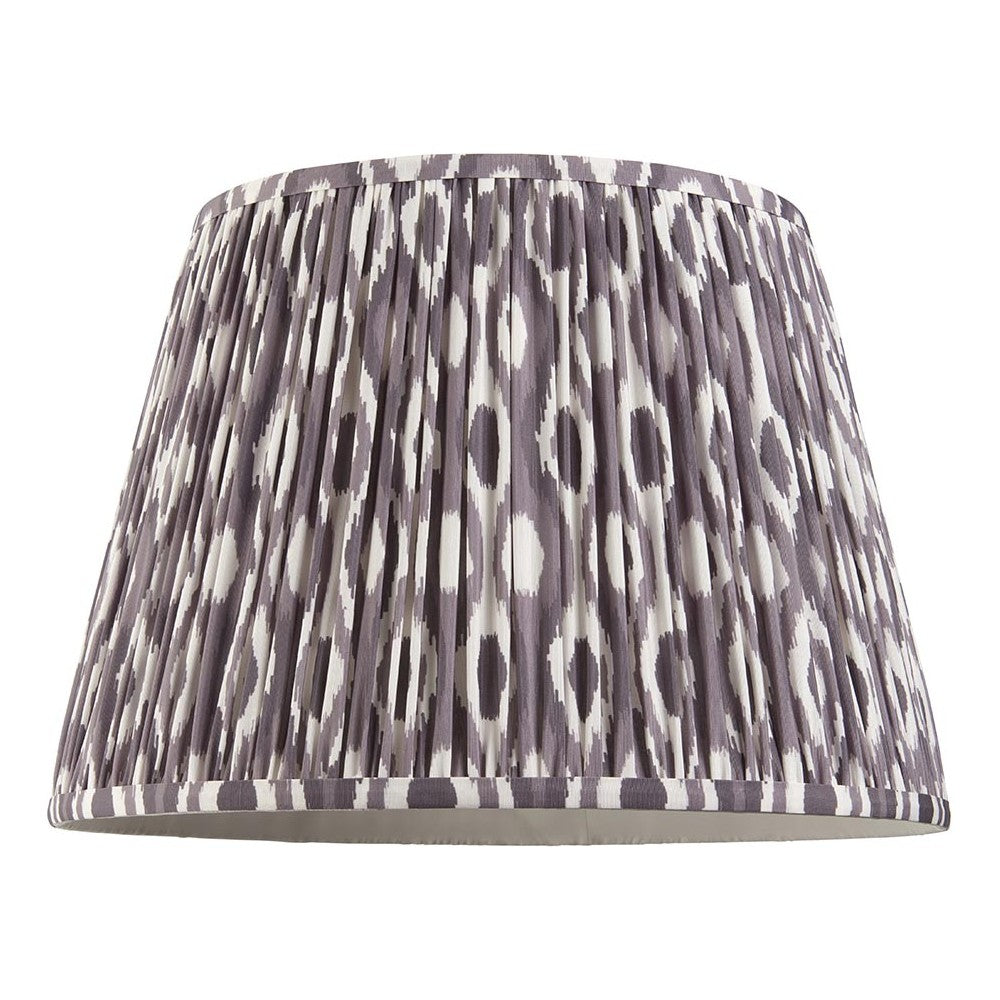 Endon Brenwell 40cm tapered lamp shade in pearl grey pleated faux silk with an ikat pattern and taped edges, shown on a plain white background.