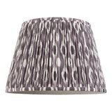 Endon Brenwell 40cm tapered lamp shade in pearl grey pleated faux silk with an ikat pattern and taped edges, shown on a plain white background.