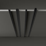 Brillia 3m recessed 1-phase lighting track in black, shown as four angled rail sections hanging from a slim ceiling slot against a plain grey background.