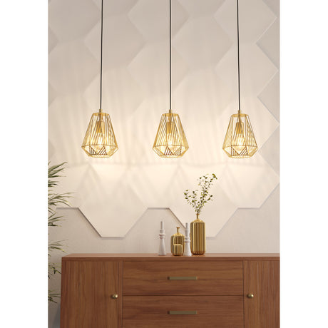 Brolvelle Linear Pendant Light in gold steel with three geometric cage shades on black cords, shown above a wooden sideboard in a dining or living room.