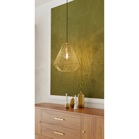 Brolvelle Pendant Light in gold-finish steel, a geometric cage shade on a black cord, hung above a wooden sideboard against an olive-green wall panel.