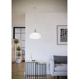 Brosmena Paper Pendant Light 55cm in white ribbed paper with a light wood collar and stem, hung on a white cord in a living room with a grey sofa and side table.