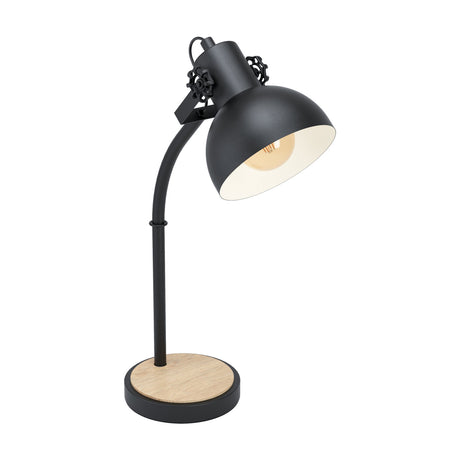 Brosora Table Lamp in black steel with a curved arm, black dome shade with pale interior, and round wood-topped base, shown on a plain white background.