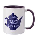 White stoneware mug with purple interior and handle, featuring a navy teapot silhouette printed with a playful "To do: Inspire Next Generation, Dunk Biscuit" list.