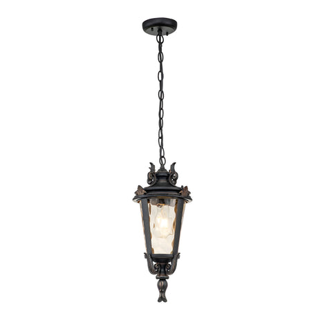 The Baltimore 1 Light Outdoor Medium Chain Pendant in Weathered Bronze boasts a decorative design with a hanging style, featuring a geometric glass shade that emits a warm glow. It is suspended from a round ceiling mount by a medium chain.