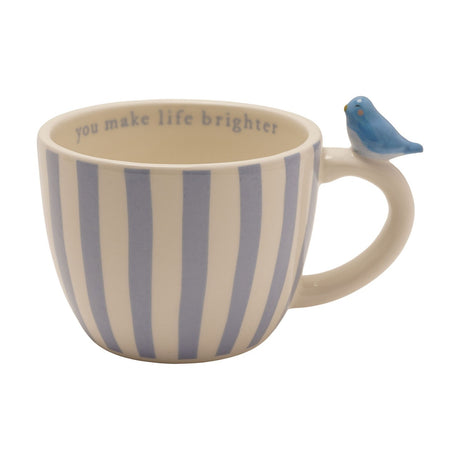 Cream stoneware mug with blue vertical stripes, a mini blue bird perched on the handle, and "you make life brighter" printed inside the rim, on a white background.
