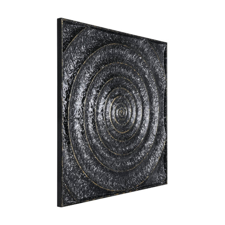 Bugrino Wall Decoration, a square black metal panel with a raised spiral texture flecked with silver and gold detailing, shown at an angle in a black frame against a white background.