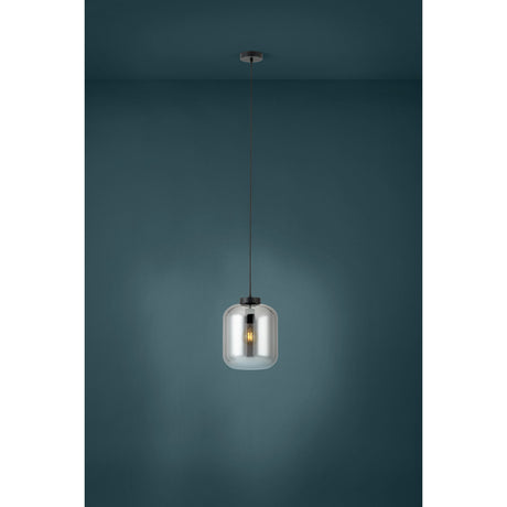 Bulciago Smoked Glass Pendant Light 25cm in Black, a single-bulb E27 pendant with a rounded shade fading from mirrored smoke to clear glass, hung on a black cord against a dark teal wall.