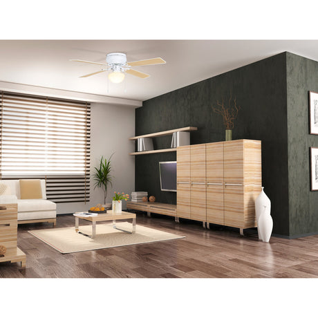 Cagliari ceiling fan with light in matt white finish, four-blade steel design with glass dome shade, shown mounted close to the ceiling in a living room with wood cabinetry.