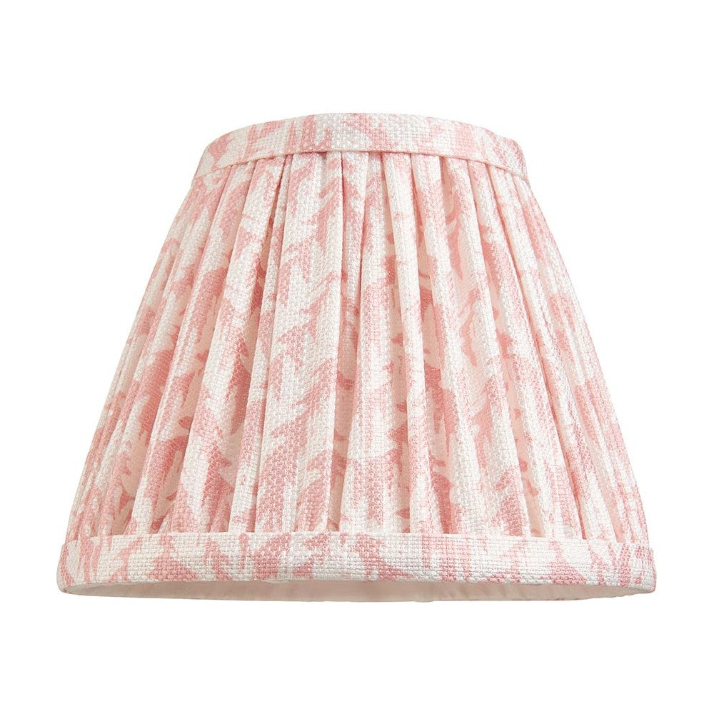 Caldgrove 16cm tapered lamp shade in Peachy Keen, pleated faux linen with leaf pattern and taped edges, shown on a plain white background.