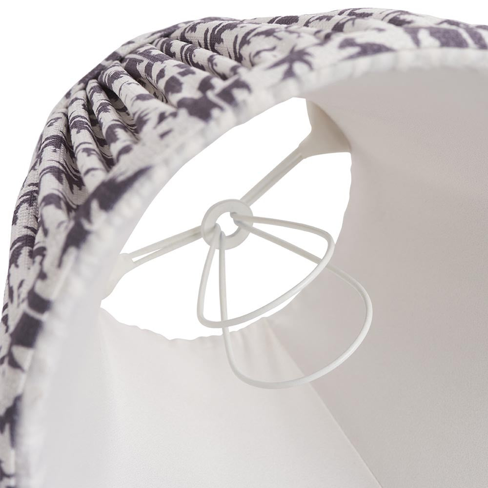 Endon Caldgrove 16cm tapered lamp shade in pearl grey, close-up inside view showing the candle clip fitting, plain white lining and pleated leaf-print trim.