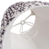 Endon Caldgrove 16cm tapered lamp shade in pearl grey, close-up inside view showing the candle clip fitting, plain white lining and pleated leaf-print trim.
