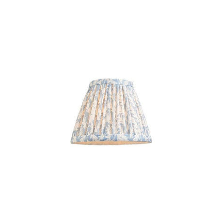 Endon Caldgrove 16cm tapered lamp shade in Shell Bay Blue, pleated faux linen with a leaf print and taped edges, on a plain white background.