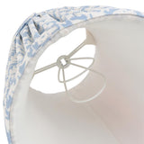 Interior view of the Endon Caldgrove 16cm tapered lamp shade in shell bay blue leaf print, showing the pleated fabric, plain lining and candle clip fitting.