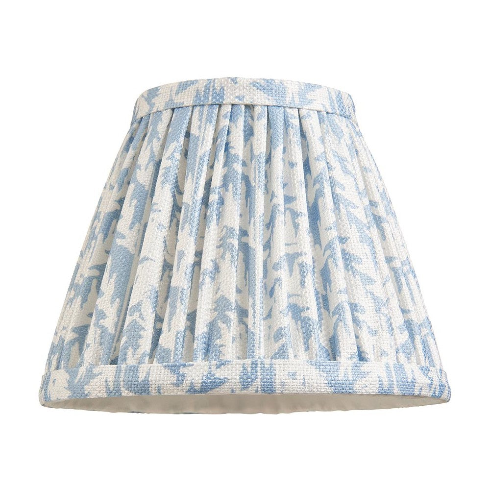 Endon Caldgrove 16cm tapered lamp shade in shell bay blue, pleated faux linen with a leaf print and taped edges, on a plain white background.
