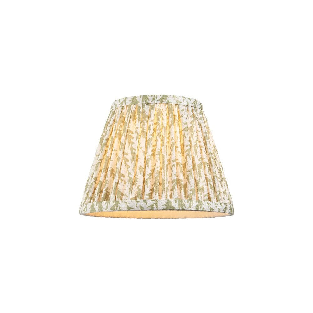 Endon Caldgrove 20cm tapered lamp shade in pleated faux linen with a green leaf print on cream and taped edging, shown on a white background.