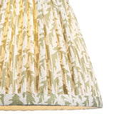 Endon Caldgrove 20cm tapered lamp shade in herb garden green, close-up of the pleated faux linen with botanical leaf print and taped edge trim.