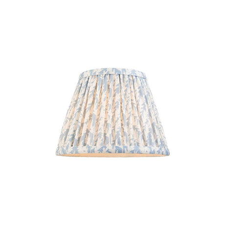 Endon Caldgrove 20cm tapered lamp shade in shell bay blue pleated faux linen with a leaf print and taped edges, on a plain white background.