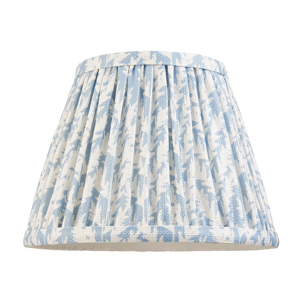 Endon Caldgrove 20cm tapered lamp shade in shell bay blue, with pleated faux linen and a leaf print, taped edges, shown on a plain white background.