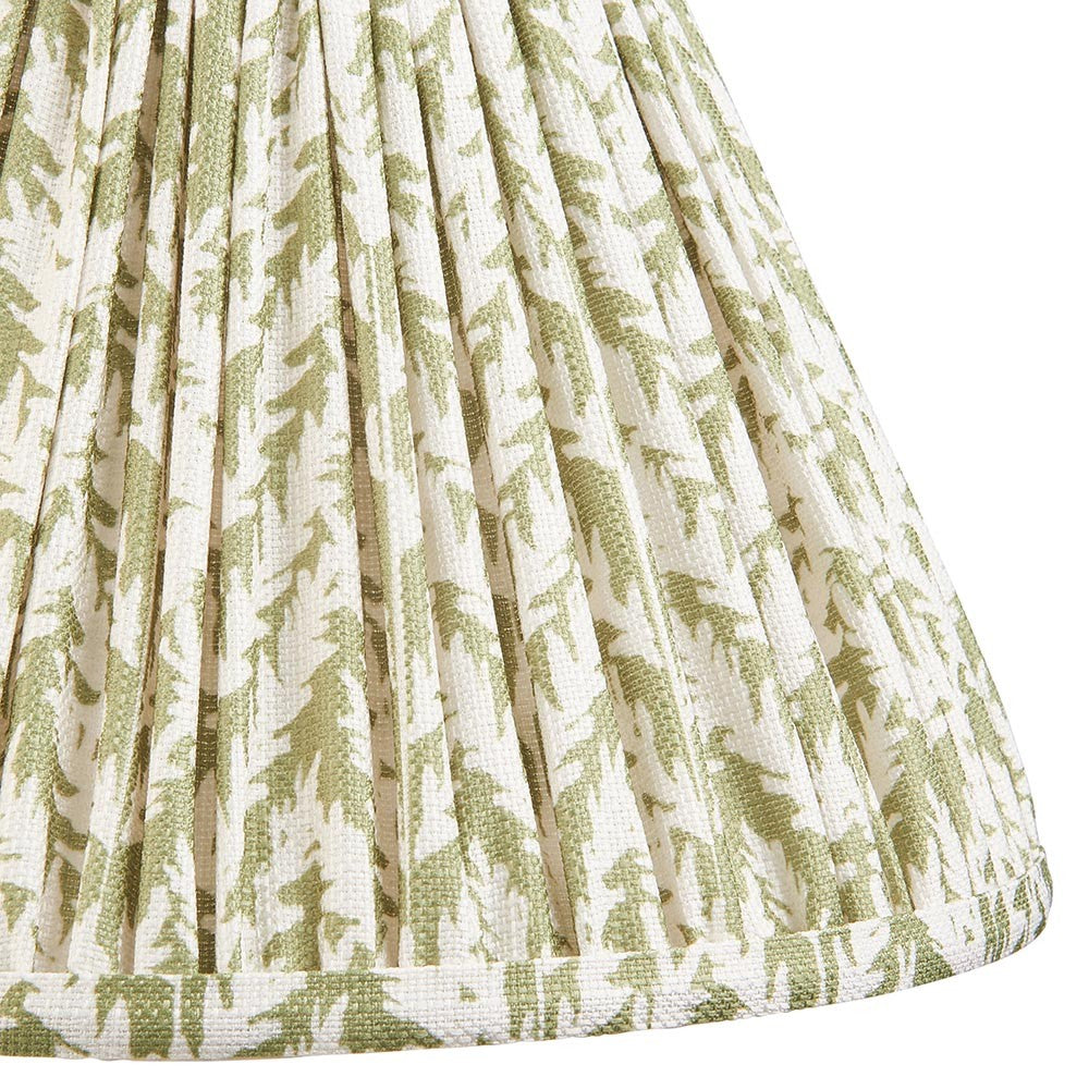 Endon Caldgrove 30cm tapered lamp shade in herb garden green, close-up of the pleated faux linen with leaf print and taped edge trim.