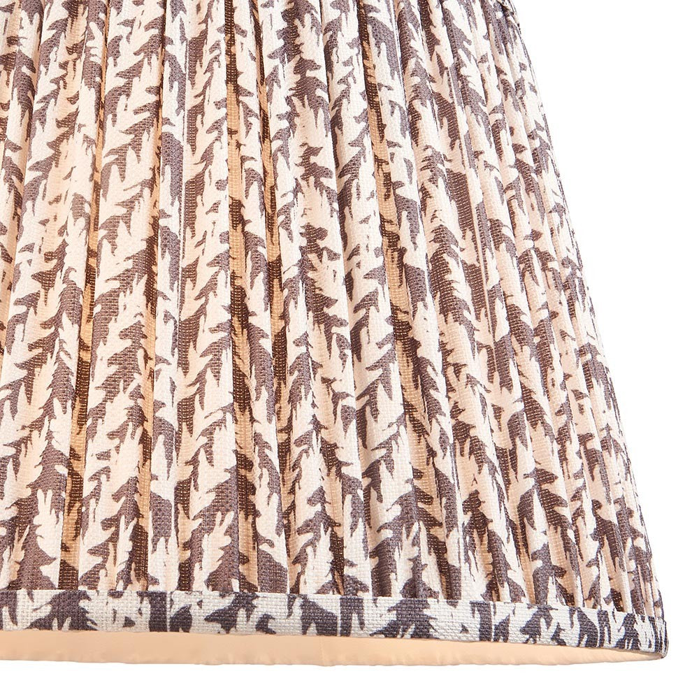 Endon Caldgrove 35cm tapered lamp shade in pearl grey faux linen, close-up of the pleated leaf-print fabric with taped edge detailing along the bottom.