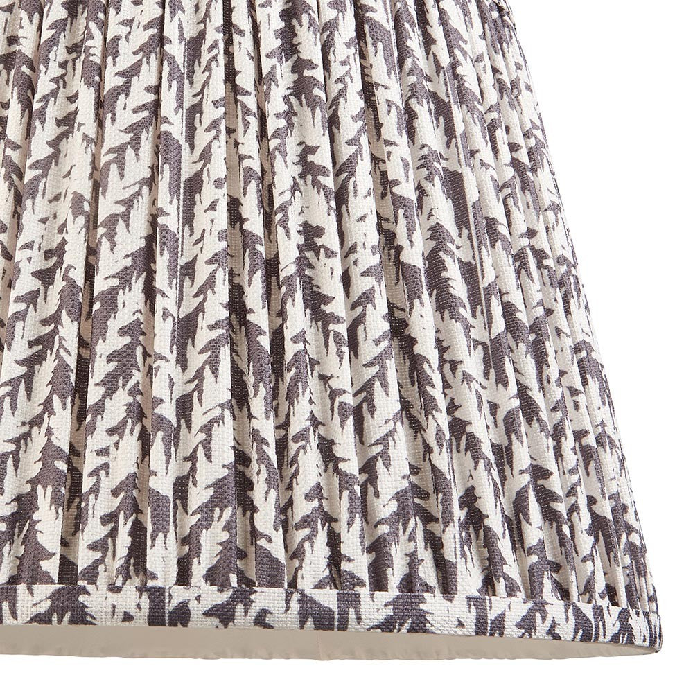 Endon Caldgrove 35cm tapered lamp shade in pearl grey faux linen, shown close-up with gathered pleats and a subtle botanical leaf print.
