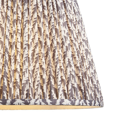 Endon Caldgrove 40cm tapered lamp shade in pearl grey, shown in close-up with gathered pleats, taped edge trim and a subtle leaf print on faux linen.