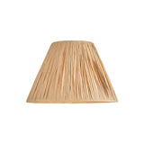 Caldwood 25cm tapered lamp shade in natural raffia, showing hand-wrapped woven texture, on a plain white background.