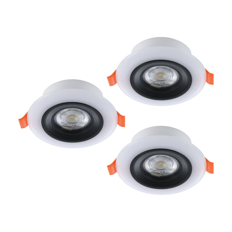 Set of three Calonge round recessed LED downlights with white outer rings, black inner bezels and orange spring clips, shown on a plain white background.