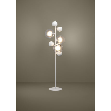 Caprecano LED floor lamp in white, featuring a slender steel stem with white ball heads, some enclosed in clear glass globes, set on a round base against a neutral background.